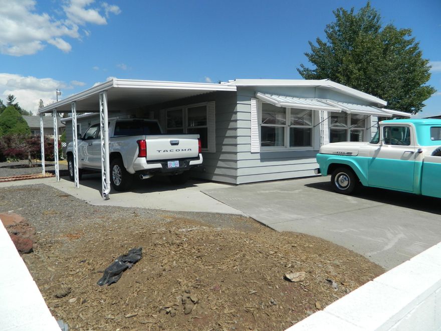 This two bedroom and two bath home has had a lot of updating done to it in the past few years. There is new laminate flooring. The kitchen has newer appliances
throughout. There is an updated gas furnace and AC. There is a carport for covered parking and full covered patio in the back. It is located in a good neighborhood with
minimal traffic for the kids. The HOA has an extra area for RV parking that is included in the fees. Don't miss out on this ready to move-in home.