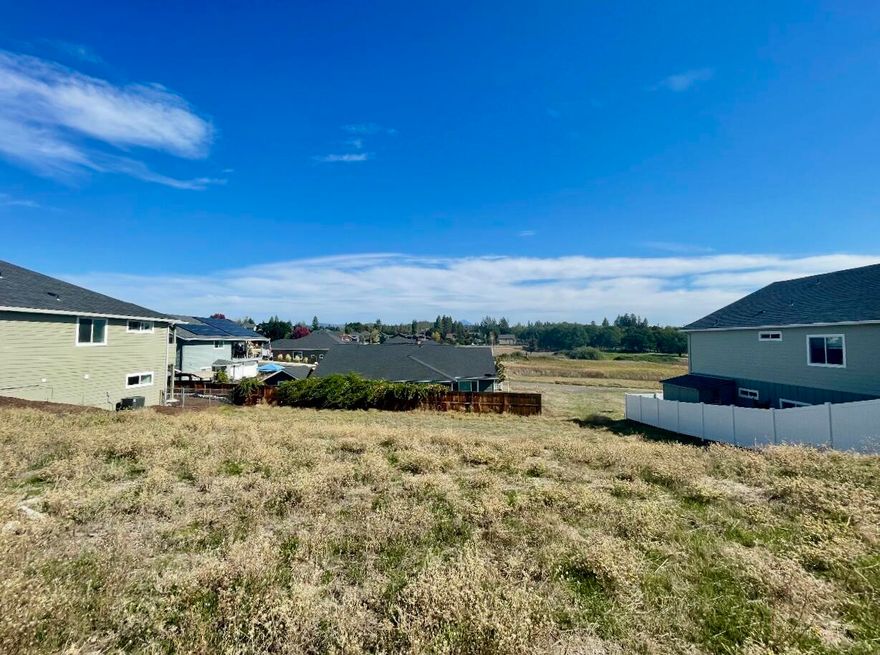 Nearly all SDC fees are paid—this .20-acre residential lot is shovel-ready and waiting for your dream home! Perfectly positioned near the Eagle Point Golf Course on a quiet, dead-end street, this property offers sweeping views of majestic Mount McLoughlin and the rolling hills beyond. Enjoy the best of both worlds: just minutes from shopping and downtown Eagle Point, yet nestled in a peaceful, upscale neighborhood. Cruise your golf cart straight to the course—no HOA or monthly association fees required! This rare gem offers immediate build potential, unforgettable scenery, and unbeatable convenience. Don't miss your chance to bring your vision to life in one of Eagle Point's most desirable locations!