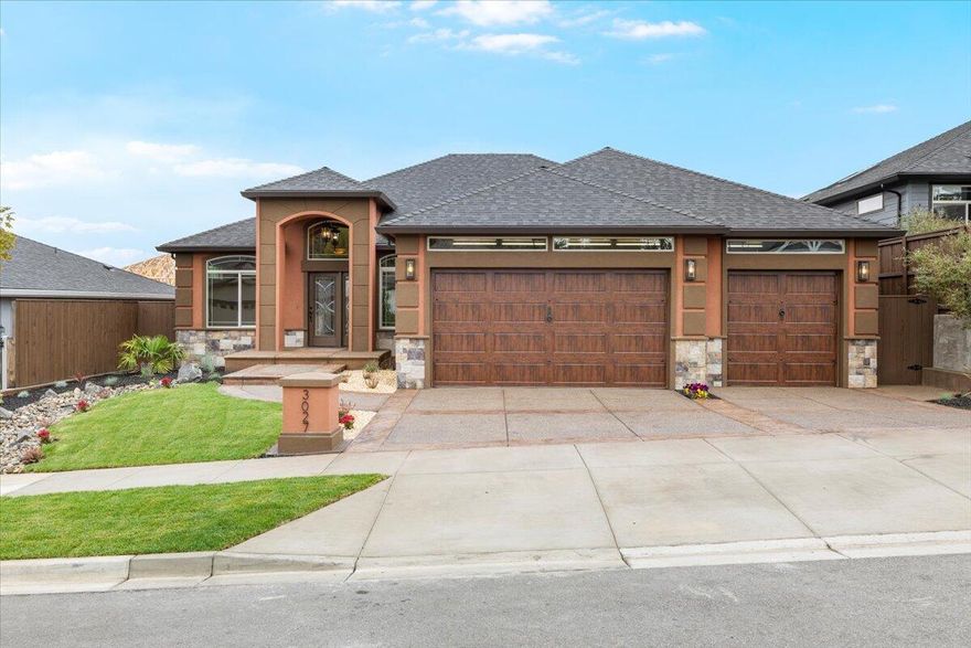 Beautiful new 2025 custom home in East Medford, minutes from the new pickleball courts and park. This property features 3 bedrooms, 2 baths, plus an office or optional 4th bedroom. Step inside to soaring ceilings, crown molding, and an open concept with vinyl plank flooring, double coffered ceilings, and a floor-to-ceiling granite fireplace with an electric insert. The gourmet kitchen offers an oversized island, granite countertops, LG stainless appliances, wine cooler, pull-out shelving, and Velux power skylights with remote shades. The primary suite includes French doors, dual sinks, a tiled shower, and a built-in PAX closet system. Exterior highlights include full stucco, stamped concrete, an 8-foot privacy fence, and professional landscaping with a decorative dry creek bed. The 3-car garage has epoxy floors, and the extended 30-foot covered patio provides the perfect outdoor retreat. A 2-10 Home Warranty completes this East Medford home.