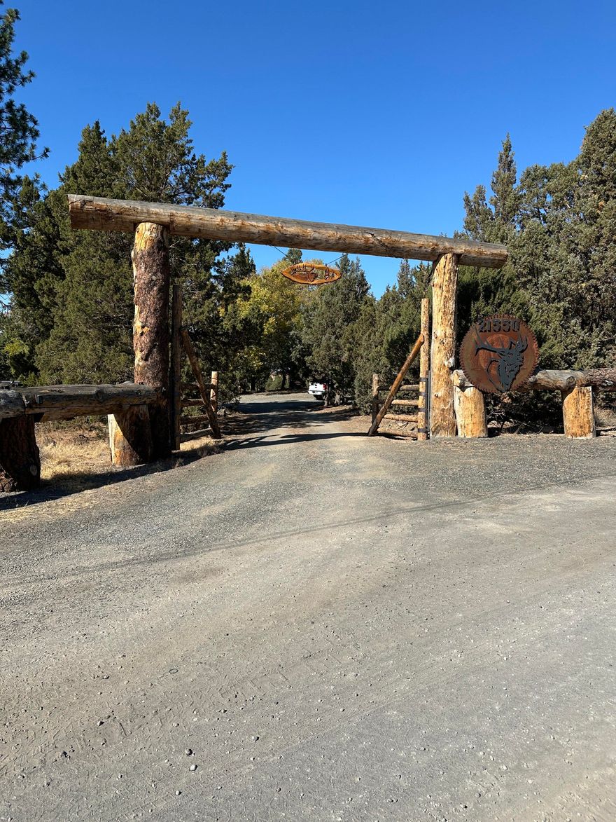 Beautiful full Mountain views from 4 bedroom, 3 bath home & property. Fenced and gated, Huge Logs. Hot tub deck, built in horse shoe pit & volleyball court in yard. Big rubber lined pond with 2 islands & a bridge with picnic area, sand beach & cabana at swimming area. Lots of grass with water feature. 3600 SQFT shop with 14 Ft doors. Avion &
well water