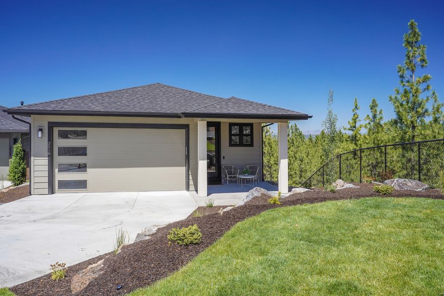 Situated on Bend's West side in the new Marken Summit neighborhood, located near shopping, schools and restaurants. This Northwest Modern style home features a creative selection of finishes and an efficient floor plan fit for any buyer with stunning Cascade Mountain views. The main level you will find the open concept great room, kitchen and dining area, and a beautiful covered deck. Kitchen details include custom cabinets, slab quartz countertops, and stainless steel appliances. The impressive primary suite boasts a  large walk in closet, tiled shower, and double vanities. The lower level has two bedrooms, bathroom, generous sized bonus room, and covered deck. and amazing Cascade mountain views! Earth Advantage Certified and built by Stone Bridge Homes NW.
