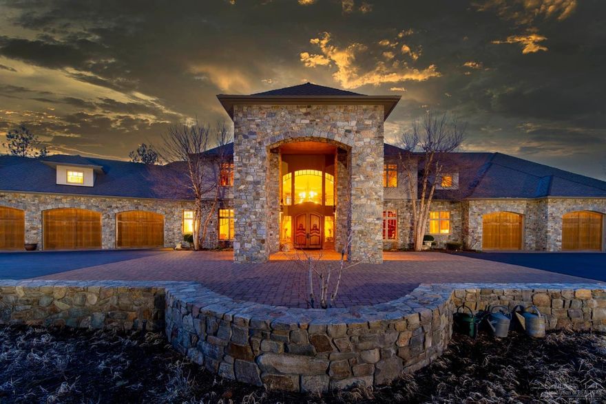 Epic French Country super custom estate situated on 2.8 acres (2 lots) with a breathtaking vantage point of Lost Tracks 10th fairway, nestled among ponderosa pines and inspiring Cascade mtn. views. This entertainer's dream has something for everyone: romantic double grand staircase, a chef's kitchen w/ high end appliances, main level deluxe master suite, executive den, 2 dual room guest suites, billiard room with bar & arcade, library, kid's castle room, art/pottery studio. Not to over look the 2 - triple car garages w/ project bay & lift encompassing 3500+ sf alone w/ personal gym - for the moto-project person. This home was hand-crafted for hospitality with extensive main-level dining/sitting rooms along with extensive rear patio entertaining w/ professional landscaping (built-in BBQ, potting room & water features) that melt right into the gorgeous golf course. Have everything & be close to everything - book a showing today!<br>