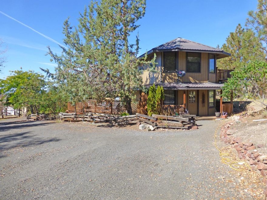 Large home with a double master layout on 4.93 acres and amazing unobstructed Cascade Mountain Views. This home has been recently remodeled and as a result you will find a large upstairs master suite w/ sitting area and a private deck, a spacious bonus room w/ tons of flexibility, a brand new roof, and many other great features. The living room is spacious and has breathtaking mountain views. Outside you will find a fenced yard large protected wooden deck area and two storage sheds.