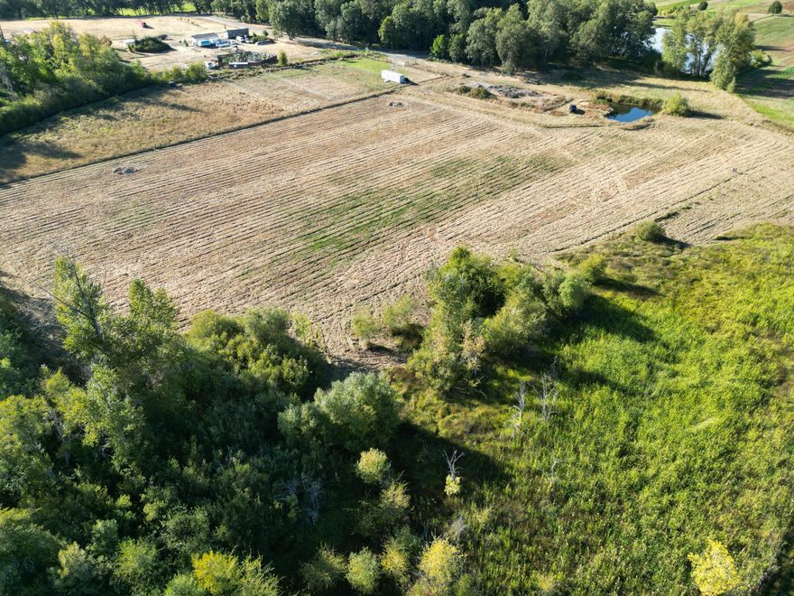 Beautiful Residential Zoned large acre parcel!! 10.86 level acres with a year-round pond, gated, fenced and cross fenced- located in the stunning rogue valley, close to the Applegate River and many locally favored vineyards & wineries. This peaceful property has been primed for development- it features a nice producing well with a brand-new pump house, a holding tank, and is almost fully irrigated through the Wilderville Irrigation District. An immense amount of groundwork has already been done, property has been leveled, and gravel pad cleared, just grab your builder and go! This would make a wonderful farming and/or horse property! Check with the County about possible partition for two buildable 5-acre parcels. You will not get tired of the panoramic mountain & valley views this wonderful property has to offer!