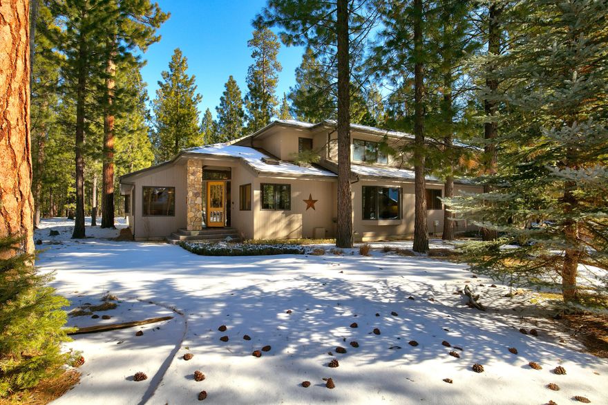 This Paul Miller designed and built home features great room with wood burning fireplace, large kitchen with updated appliances, breakfast nook, dining room, primary bedroom on the main floor with propane fireplace, two additional bedrooms upstairs, two full bathrooms, loft/flex space with tons of storage, large patio with hot tub and attached two car garage with shop area. Come see GM 376 today!