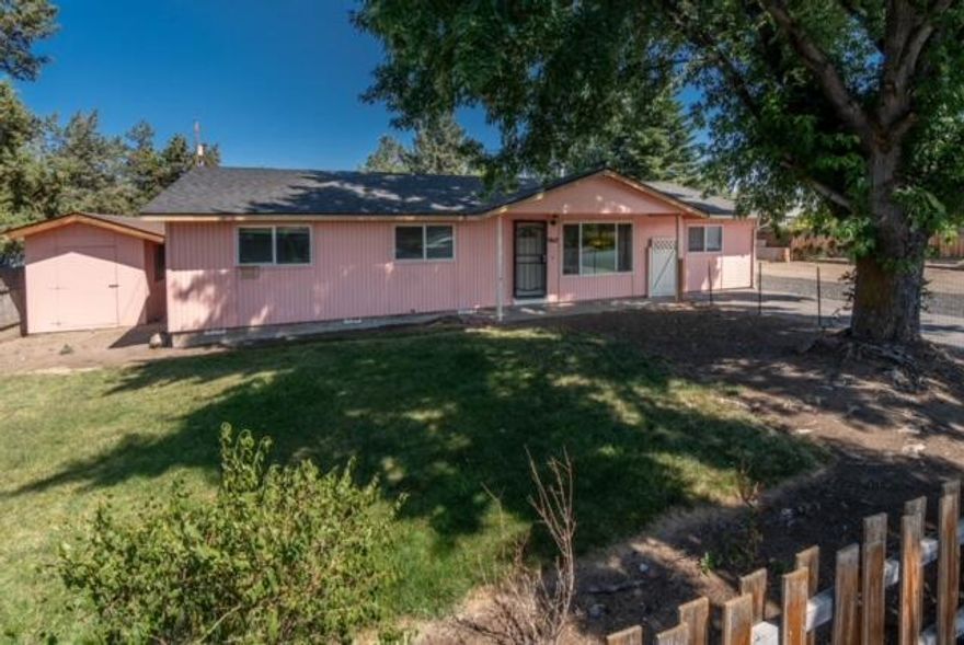 Large corner lot in SW Redmond with room to grow.  The property features two storage sheds, RV parking, covered patio and a fenced yard.  Conveniently located to The Dry Canyon, parks, schools, and shopping.  Home is move in ready.