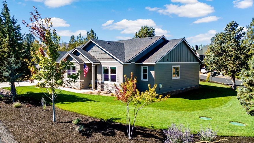 Experience Central Oregon living at it's finest in this newly built 2023 craftsman style single level home in the desirable Ridge at Eagle Crest golf community. Step inside to vaulted ceilings and an open floor plan perfect for entertaining. This home features upgraded California Closets, a beautifully designed kitchen, stainless appliances, custom window treatments and has a large custom water feature! The primary suite is very spacious and has a large walk-in closet, a walk-in shower and double sink vanity with soaking tub. The attached two car garage includes epoxy floors for a clean polished look. This home boasts a large corner lot with a sprinkler system and beautiful landscaping.