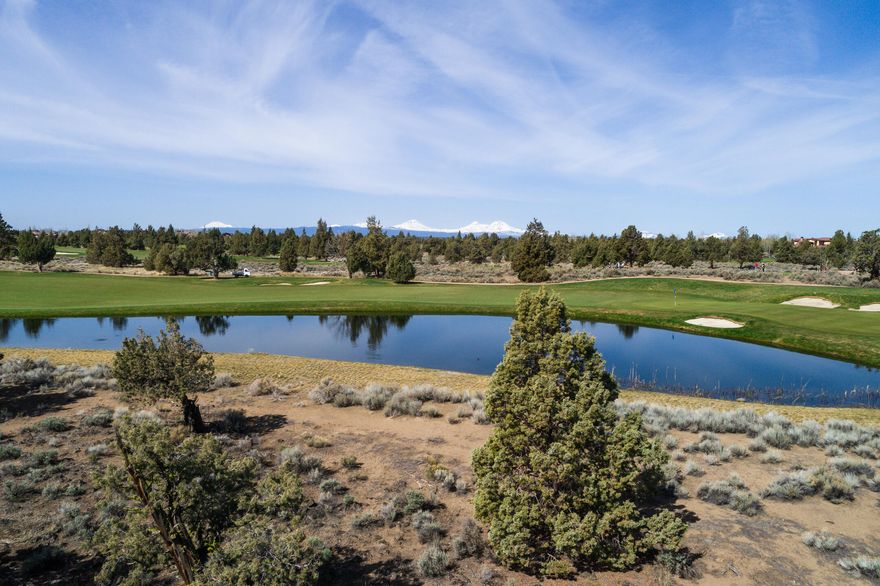 Prime Location on the Nicklaus #8 Fairway in the private, gated community of The Estates. Your journey ends here on this easy build site surrounded by World Class Golf and open space! Design and build your next home right here on this tranquil homesite with Cascade Mountain views and also of the lake. Enjoy all the amenities of living a Pronghorn life! Members Club, gated entrance, Restaurants, Day Spa, Two Championship Golf Courses, Fitness Center, Pools, Paths, Dog Park, and surrounded by over 20,000 acres of BLM land and trails. A Pronghorn Club Membership is included and transferred at closing.