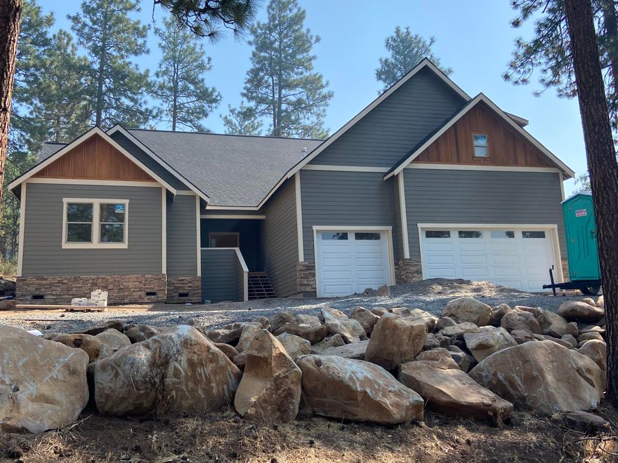 New Construction! This Gorgeous Custom Built Home overlooks the Arnold Palmer golf course! Enjoy the many amenities of the Running Y Resort!  This home features: Spacious Open Floor plan, Gas Fireplace, 6 burner gas stove, double ovens,  large pantry's, Vaulted Ceilings with over 3060 sq ft. Plus many more!  This home is still under construction, come view it now and pick out your own personal finishes!
Price could be adjusted either way according to your finishing touches!