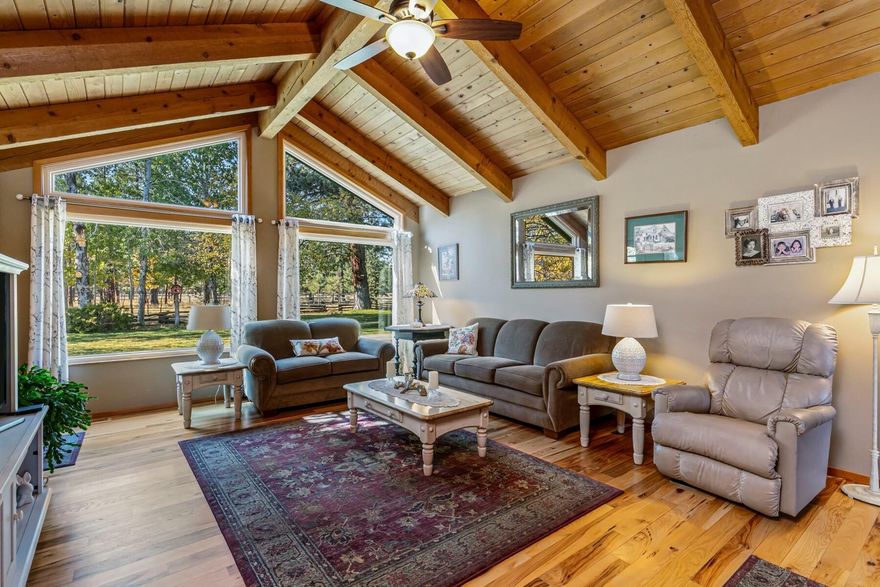 Experience the perfect harmony of comfort and nature with this stunning single-level home, available on the market for the first time! Located in the highly desirable Indian Ford Meadows subdivision off Crooked Horseshoe, this property spans over 5 acres of tranquil landscape, making it a haven for nature lovers and animal enthusiasts alike. As you enter, you'll be greeted by vaulted ceilings that create an airy ambiance throughout the home. The inviting wood-burning fireplace adds a touch of warmth and charm to the living area. The kitchen flows effortlessly into the dining and great room, providing an ideal setting for entertaining family and friends. In addition to the beautiful home, a spacious barn/shop awaits, featuring four dedicated, fenced animal loafing sheds that are perfect for livestock or extra storage. Enjoy the best of both worlds with downtown Sisters just minutes away, while reaping the benefits of being steps from the vast National Forest.