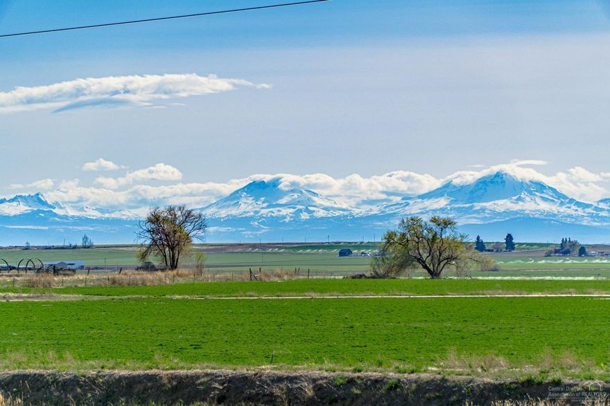 Enjoy panoramic Cascade Mountain views from this brand new Golden West home on a 1.14 acre lot situated between Culver & Madras. 3 bedrooms & 2 full baths w/Master separation. Great room layout with amazing views from the living space, Master & guest room. Open Kitchen w/central island, sleek black appliances & plenty of storage. Adjoining mud room/laundry makes a great walk in pantry w/enough room to add a freezer or 2nd refrigerator. Master Suite offers an oversized bath & walk in closet, bedroom is lg enough for a King bed, dressers & a desk plus chairs. Corner lot has easy highway access & could accommodate semi truck parking. Or bring your pets, horse or RV's - there is plenty of space here! New house, new septic, Deschutes Valley Water & Pacific Power. Turn key & move in, it's ready. USDA, VA or FHA financing available - call a REALTOR for details!