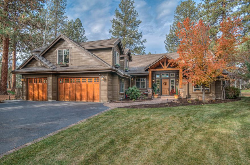 This fabulous home on Green Lakes Loop in Broken Top features a split plan with multiple upgrades and unique features and a view out to the 16th green and 17th tee box. Enter in the large vaulted living room with a view of the golf course. The remodeled modern kitchen flows into the dining and tv areas and features a built in refrigerator, freezer and wine/beverage refrigerator with a center island. Main floor living includes 3 bedrooms (the large primary suite with bathroom and WIC, and 2 bedrooms), office, living room, kitchen, dining, tv area, one full bathroom, a half-bath, laundry/pantry room and a 3 car garage with built-ins. Upstairs you'll find a bonus room/guest suite with a remodeled kitchenette and bathroom with it's own eating area. The back patio provides an ideal outdoor entertainment area with a forested feel and water feature. Experience a life of comfort while taking advantage of the exclusive amenities offered by the award-winning Broken Top golf course and community