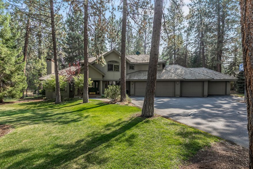 Calm tranquility is what you will find in this wonderful custom built home in prestigious Sunrise Village. Close access to Mt. Bachelor, the River, the Athletic club and forest trails, this .61 acre treed lot bring all Central Oregon offers to your doorstep. The floor plan includes an open kitchen, 3 spacious bedrooms, 2.5 baths, and a dedicated office. The upstairs main bedroom and bath offer a walk in closet, and a jetted tub. In addition to the sq. footage is an additional approximate 168 sq. ft private office space with a murphy bed accessed thru the 4 car garage. It has it's own door to the beautiful oasis backyard. Sunrise Village has a pool, hot tub, changing rooms, club house, tennis courts, RV storage and walking paths all thru nature and access to the Deschutes River.