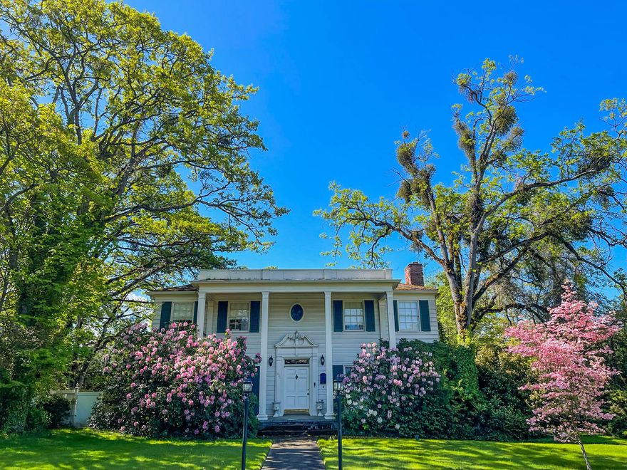 Come see for yourself this gorgeous Frank Clark home and guest house.
You will love the estately front yard and the front porch with its pillars.  Once inside, the feeling changes from grandeur to ''welcome home,'' with the grand staircase, exquisite crown molding, and hardwood flooring.  The main floor living area features a living room, reading room, gourmet kitchen, breakfast nook, & formal dining room.  You'll love the updated kitchen that is perfect for the most discriminating chef and for entertaining with its high end appliances, cabinetry and countertops.  Four bedrooms upstairs including the large master suite  and luxurious master bath with double vanity and claw foot soaking tub..  There are two  additional bedrooms w/o closets.  The guesthouse is perfect for visitors.  New shingles installed 7/23  and two new heating units installed 6/23.  Don't miss the 3D tour!