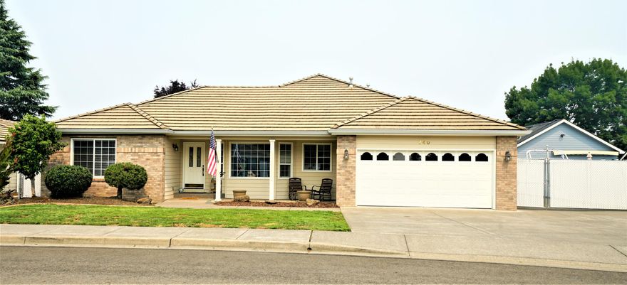 Located in one of Central Point's most desirable neighborhoods, Jackson Creek Estates! This classic community is a tree-lined scene of beautiful homes & well cared for city parks. It is near medical services, the local schools, shopping, & all city services. This lovely home offers quality and comfort throughout. Living, formal dining, & kitchen areas are spacious with ample cabinetry & counter space. Interior is light & bright. Each of the three bedrooms are of nice size, with large closets for storage space. The big mstr. ste. is private, due to the split floorplan and the bath features a jetted tub and a dbl. walk-in shower. The gas fireplace in the living room adds to the cozy ambiance. The living room has easy access to the covered, shaded patio. You'll enjoy the big laundry room, easy care landscape & water feature, detached shop and spacious Gated RV Parking! (65'x 11' & has full hook ups). The finished detached shop is 16'x20', has lights, heat, and could be a studio!