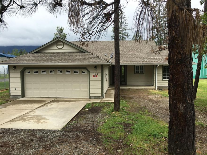 Best value for newer 3/2 in Cave Junction. Vaulted ceilings and split bedroom design make this one a winner. All new exterior paint, flooring, dishwasher and refinished hard wood floors. There is RV electrical hook up on the side. Rear patio and front porch area for outdoor enjoyment. HVAC has been serviced. Seller providing a 1-year home warranty.