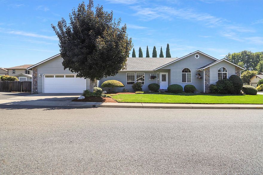 Fabulous Location and Neighborhood!! This single-level home is in immaculate condition. With a spacious open floor plan, abundant windows, vaulted ceilings, split floor plan, 1832 sq. ft. of living area, 3 bedrooms, 2 baths, plus an additional office room, large 2 car garage, on a .21 acre lot. Matured landscaping with automatic irrigation system in front and back. A fenced back yard, covered patio, hot tub and room for a smaller RV or trailer. It is near the river, Reinhart Park, town and shopping which makes this a wonderful place to call home.. New Furnace, Air Conditioner and Roof in 2021.