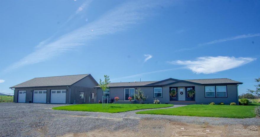 Endless opportunity with this 76 ac farm with a half pivot, fully piped steel pens with concrete loading chute and 3 pasture areas with loafing sheds. Newer triple wide manufactured home, 4 bedroom/1bonus room, currently used as an exercise room/3 bath has many upgrades including granite counters, open great room and a family room, huge laundry room with office space. Two additional homes all updated, barn/shop with power.