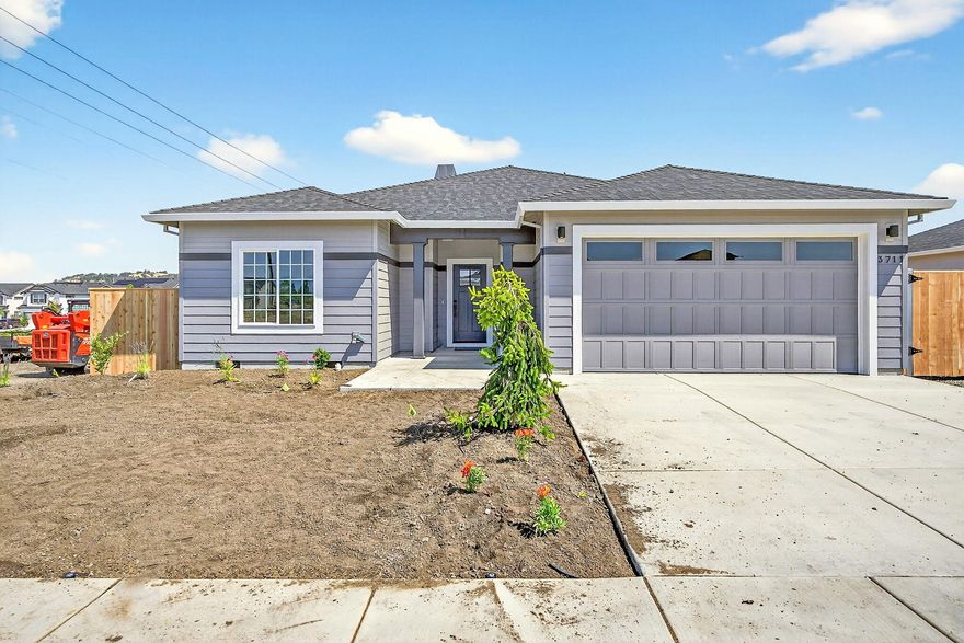 Built in 2025 in a beautiful country setting in Medford area with views of the surrounding mountains nearby! An exceptional quality builder that we've grown to love in the
valley throughout the years is what you get when you purchase a home built by Pac Trend Homes. A Stunning craftsman styled home with approximately 1725 sq ft, 3
bedrooms, 2 full baths. Features an open kitchen with beautiful quartz counters, including high end light fixtures and stone fireplace. Custom cabinets are birch and alder with the highest quality in the industry.  Luxury vinyl plank flooring in the entry, kitchen, living room and hallways. Bathrooms and laundry include tile flooring. Professional landscaping in front and back round out this house. Estimated completion date July 2025. Other lot and home packages are available. Listing agent is related to seller. Pictures are for illustration purposes only.