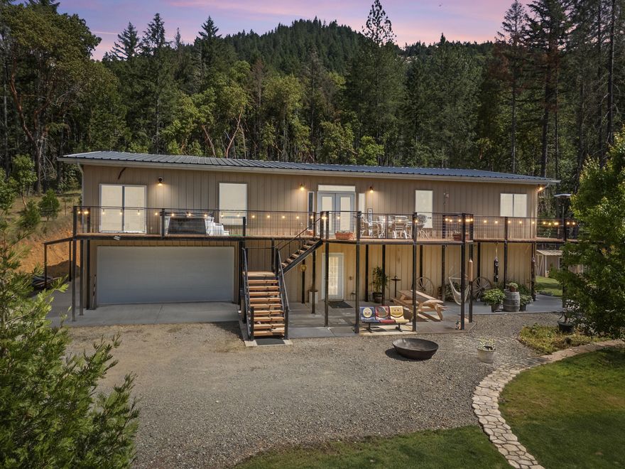 Enjoy luxurious country living with over 2,800 sq.ft. of finished space plus and additional 2,400 sq.ft. with multifamily potential. This stunning home offers 3 bedrooms, 2.5 baths, 2 laundry rooms, vaulted ceilings, and a spacious bonus room with a slider to a private deck. The chef's kitchen features double ovens, custom cabinetry, a large pantry, and a 3-zone on-demand hot water system. Set on 2 usable acres with breathtaking mountain views, this property includes ductless heating and air, an attached garage with updated finishes, and covered RV parking with full hookups. A perfect blend of comfort, space, and flexibility for extended living or rental income possibilities.