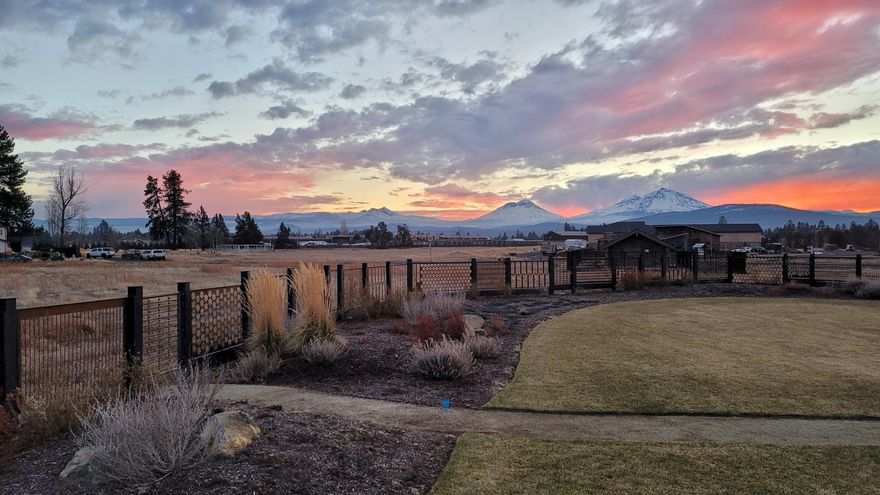 LOT 21: The GRANDE RONDE. A dramatic blend of modern/rustic w/ facade that features gorgeous stone offset w/ energy efficient fiber-cement siding. The distinctive roof-line, covered entry & abundant windows add to designer feel, making a first impression that lasts. This home opens up to an expansive great room where 16' vaulted ceiling & large geometric windows allow the mountains inside. Living & dining are set off by a spectacular peninsula fireplace. The sleek spacious kitchen comes with 24+ ft of counter space & cabinets plus built-in island microwave. The butler pantry, recessed fridge, floating shelves add to the custom feel of the space. Two master suites flank the rear of the home with oversized windows to capture the mountain view plus a substantial walk-in closet. MBR1 features luxurious frameless shower + hidden commode & 11' vanity counter. Earth Advantage Gold certification. Seller is licensed real estate broker in Oregon.