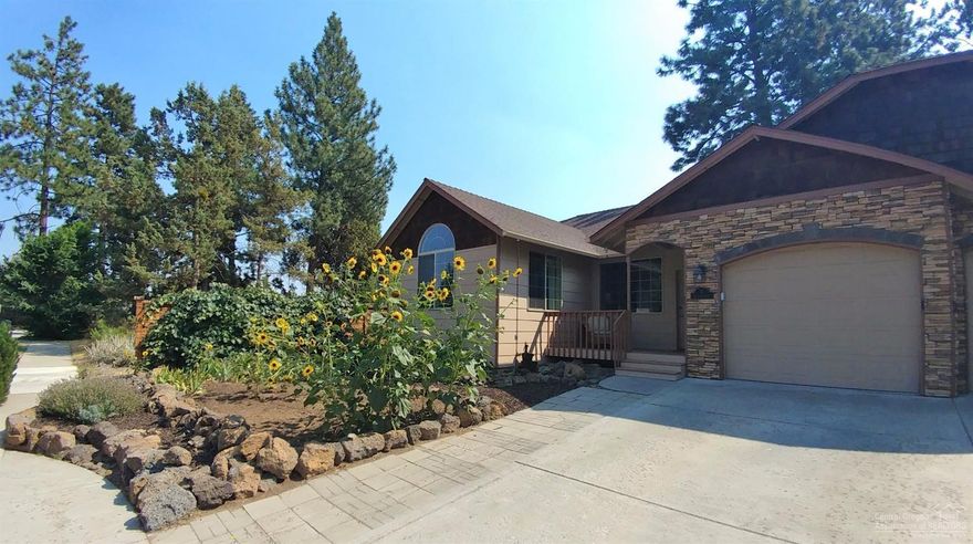 Right in the heart of the Old Mill District, this charming light & bright single level townhome boasts high vaulted ceilings throughout, granite counter tops in kitchen, and laminate hardwood and travertine flooring. Easy access to shopping, restaurants, parks & events, & beautiful Deschutes River. Front yard features beautiful mature grapevine. Enjoy the fully fenced private backyard with a covered patio. These townhomes don't come available very often...don't miss this opportunity. No HOA dues!