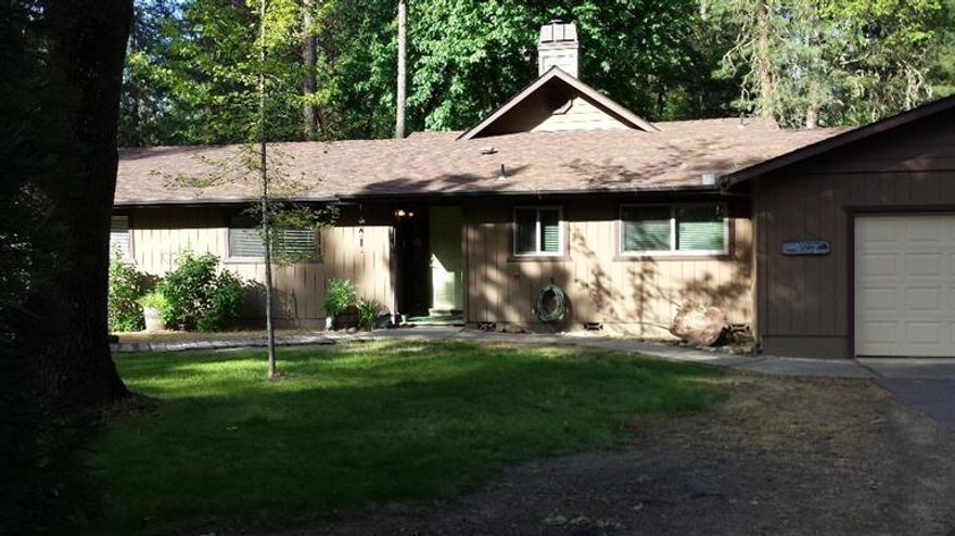 This is a Beautiful River front property...Features Quite Country Atmosphere with Trees Lawn and the Grounds have been groomed and tree work over the years...yields a beautiful setting to enjoy the Full pleasure of the Rogue River...Home sets back a bit to enhance privacy...30 x 40 shop with RV Bay... 1/2 bath Includes heavy duty lift..RV parking with hookups...New Heat Pump installed August 2014, New Windows in kitchen and great room...2011 (maintenance History ...see attached documents)