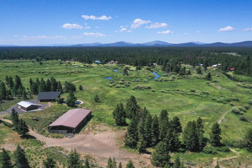Beautiful buildable lot on the Little Deschutes River with expansive views of Mount Bachelor, Broken Top, and the Sisters. Imagine catching rainbow trout as you watch the elk stop for water, then enjoying dinner on your newly built deck as the sun sets on the Cascades and valley. This is your private paradise... enjoy it! Lot has well and large covered horse arena with attached work shop. Minutes from Cascade Lakes, Sunriver, Bend, skiing, and endless recreation. There is an option to buy the log cabin and an additional 9.66 acres next door as a package (16762 Sandy Ct., La Pine OR 97739). This is your chance to own 19.73 acres of river front property.