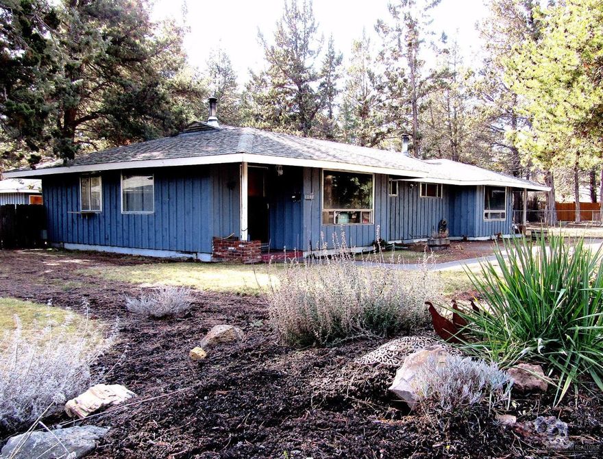 Midtown charmer now available. Wonderful location very near the Larkspur Trail, Pilot Butte, Juniper Park to name a few. Vintage charm with original wood floors, updated wood stoves, laundry rooms with hook ups & storage, large fenced yards, each unit has a garage, plus a storage shed all make this duplex next to ideal. Lovely mature trees decorate this oversized lot. Possible lot split, buyer to verity with City.