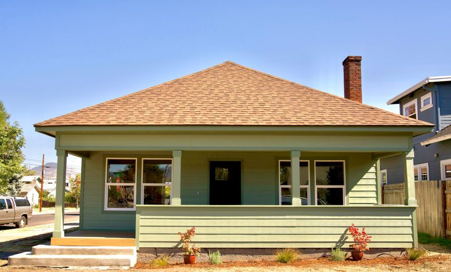 Welcome to an original and charming 1928 built bungalow. Completely remodeled and renovated in 2025. Featuring 1,377 sq ft, 3 bedrooms and 2 full bathrooms. A beautifully lit family room with a fireplace which flows into a dinning / eating area. In the kitchen you will find gorgeous cream wood custom cabinets with granite counter tops, new stainless-steel appliances, laminated white oak wood floors throughout, all new ductless efficient heating and air, tankless water heater, tiled shower in primary bathroom, all new windows and doors / hardware, completely new electrical panel and wiring throughout, new insulation, fresh paint both interior and exterior. Enjoy the large covered front porch with new Trex flooring on these fall days. There is room to build a garage if desired.