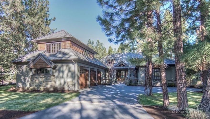 Stunning Northwest-style home in gated community of Broken Top. Inviting, open floor plan welcomes you with warm designer finishes throughout. Spacious great room features beautiful vaulted ceilings, wood beams, stone fireplace. Gourmet kitchen complete w/ slab granite counters, Viking S/S appliances, custom cabinets. All three bedrooms on main level. Bonus room & office upstairs over large 3 car garage. Gorgeous 1/2 acre corner lot, beautifully landscaped yard w/large paver patio. On a quiet cul-de-sac.