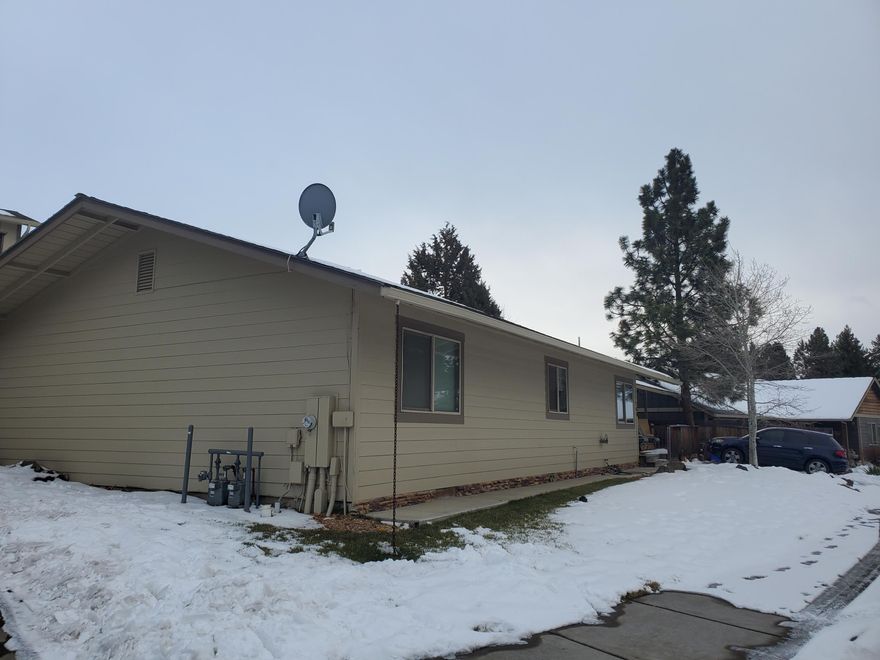 Single level 4 bed 2 bath ranch style family home with detached 2 bedroom, 1 bath ADU that sits above large garage.  Great investment opportunity or live in one unit and rent out the other.