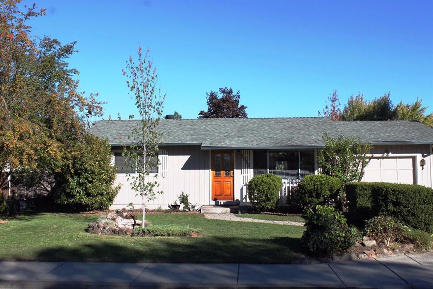 Welcome to 8030 Hale Way. This is a very nice 2 bedroom home plus an additional room (that could be used as a 3rd bedroom), one full and one half bath & 1368 square feet of living space. It has been newly updated with new carpet & paint. There is both a living room & large family room for enjoyment. The living room has laminate flooring, the kitchen offers tile counter tops, wood cabinets, pantry, lots of storage & new vinyl flooring. Family room has a gas fireplace with built in shelves & the dining room has French doors that lead into the spacious backyard. The backyard is a gardener's paradise with plantings & 2 patios, one that is covered. There are three water features that complete this peaceful & serene atmosphere. There is also a storage shed. The roof on the house is approx. 6 years old and the heat pump is approx. 4 years old. The garage was converted, with permits into a large storage room with a closet and window as well as a half bath. The partial garage is now a shop.