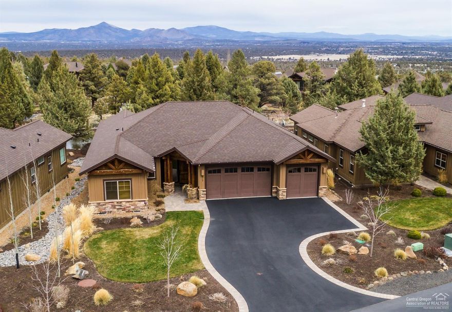 Exceptional single level home built in 2015 but barely lived in. Granite counters, wood and tiled floors, built-ins and a fireplace. Spacious master suite separated from guest rooms,wonderful views of the water feature from the living and dining area. Enjoy the patio or take a short walk to the sports center. All Eagle Crest amenities included.