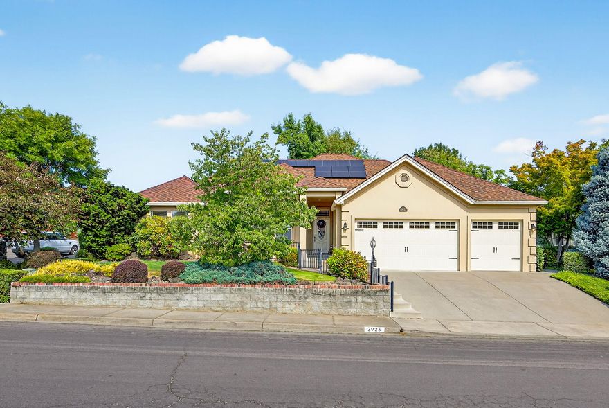 This beautifully maintained single-level home offers a timeless and functional layout. Inside, you'll find both a formal living room and a separate family room, a dedicated office, and an open-concept island kitchen with a generous walk-in pantry. Hardwood flooring runs throughout the main living areas.
The bathrooms have been updated, with the primary bath featuring a large and beautiful walk-in shower, dual sinks, and heated floors. The spacious primary suite includes vaulted ceilings, a small fireplace and walk-in closet.
Energy efficiency is a highlight—paid free and clear, the solar panels keep the average electric bill at $18 or less. The home also includes a durable 50-year roof, a newer HVAC system, and two brand-new garage doors with openers. Enjoy the private backyard retreat with a charming pergola-covered patio, perfect for outdoor entertaining.