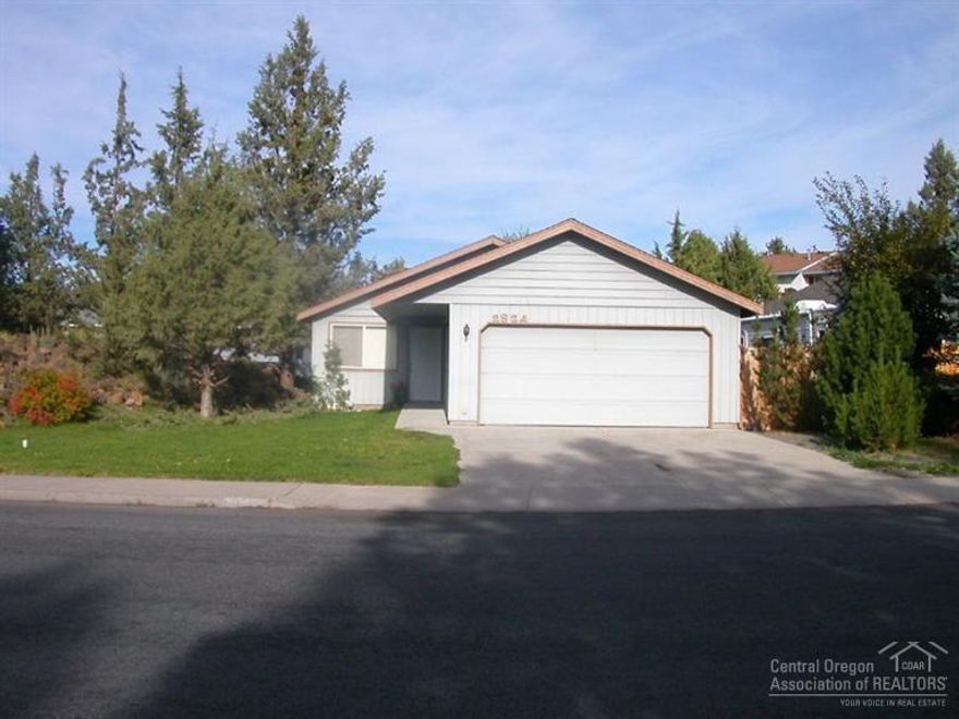 Great NE home features open floor plan, utility room with extra storage, ample master bedroom. Exterior features large deck for entertaining and large natural rock outcropping.