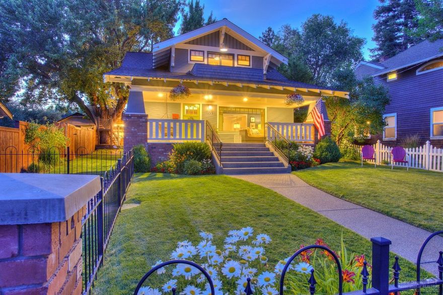 Iconic downtown Bend craftsman home. Watch Mirror Pond and Drake Park from the expansive elevated front porch of this updated 4 bedroom, 2 bath home. Or enjoy the river views from the private master bedroom balcony. Much of the home has been remodeled over the past few years. Private driveway off Harmon and paved alley parking for you and your friends when the downtown events are going on. Lots of custom built-ins and a large attached 2 car garage for storage. In the center of downtown, Galveston corridor and Newport corridor-you won't have to drive from here. Unique finished basement makes for a great bonus area.