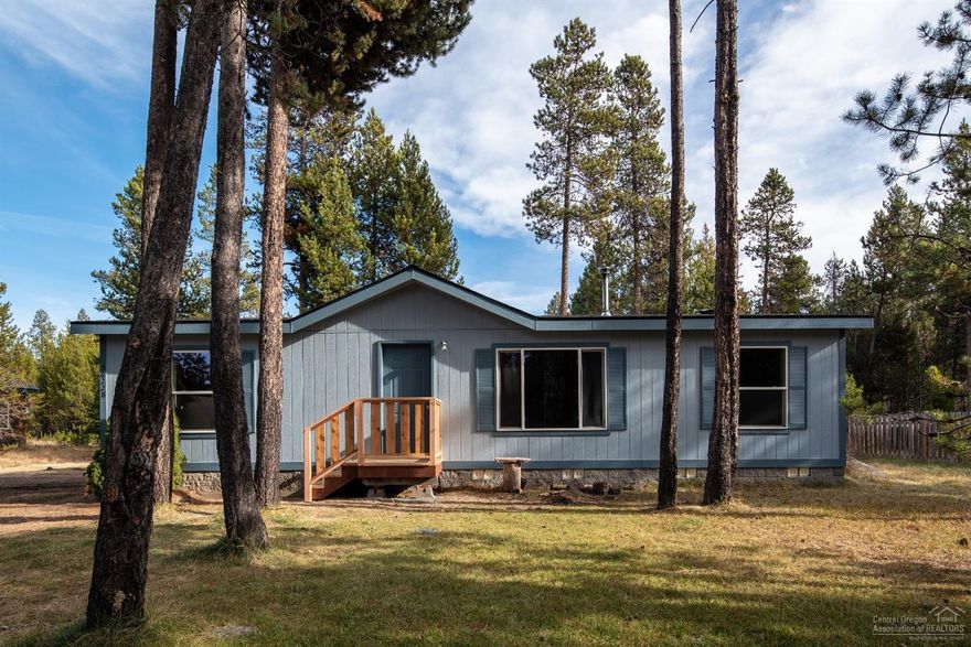 Bring your best offer! With the Deschutes River just minutes away, this home is in the heart of Central Oregon's finest recreation area. Winter fun at Bachelor is only 24 miles - this just renovated home is a perfect getaway or family hub. New roof, interior & exterior paint, carpet in the bedrooms & Luxury Vinyl Plank flooring & a brand new SS range too! This turn key home is ready to go, situated on a quiet paved street w/mature pines & low maintenance landscape. Great room floor plan with Master separation, open Kitchen & dining, washer & dryer in the mud room are included. Newly constructed front & back decks - just bring your toys & enjoy!