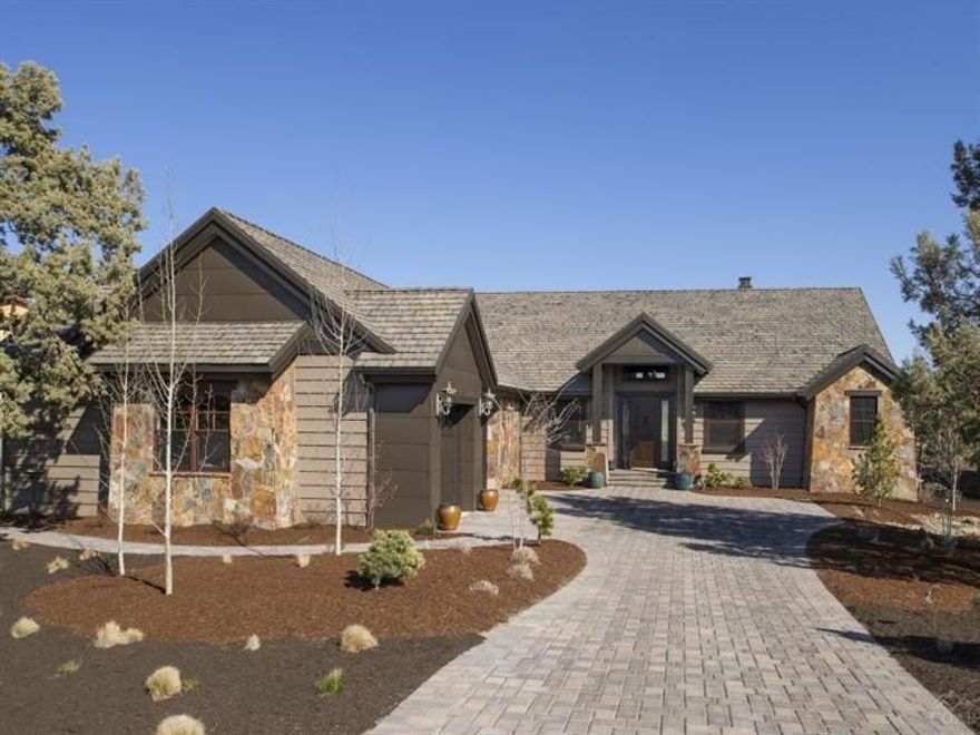 Contemporary elegance in Tour of Homes listing. Natural light cascades through windows overlooking 5th hole of Nicklaus Course. Open floor plan w/Brazilian walnut flooring, backlit coffered ceilings, solid alder & mahogany doors & en suite bedrooms. Gourmet kitchen boasts single slab granite island, stainless steel appliances, 6 burner gas stove & convection oven. Great room w/gas fireplace, gorgeous master bath w/walk-in shower & soaking tub & 1600 sq. ft. paver patio w/gas fire pit. Membership included.