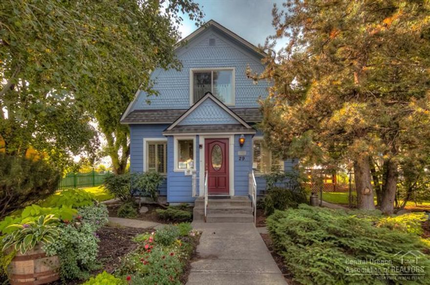 Hard to find Commercial zoned rental property in downtown Bend! 3 dwellings, all currently rented. Lg house is a 3br, 4 bath, 1797sf w/chef style kitchen, hardwood floors, updated for functional work spaces. 2 additional rental units in back; 1br, 1 bath cottage. Second cottage is a studio. Detached 2 car garage w/attic storage plus 3 more parking spaces & 1 handicap space. Property is professionally landscaped, well maintained & Turn Key!