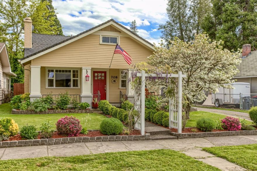 Charming and wonderfully updated craftsman home in E Medford. This home features an open floor plan with 1 bedroom, 1 bathroom, finished large attic that has a variety of uses, wonderful basement with electrical and lighting, beautiful hard wood floors and storage galore. Lovely living room offers a gas fire place and is open to the spacious dining area. Gourmet kitchen features a large island with breakfast bar, duel fuel 5 burner gas range/convection ovens, granite counters, stainless steel appliances, refrigerator and walk-in pantry with cabinets. Huge bedroom with 2 closets, near full bathroom with tile floors and tub/shower. Fantastic separate laundry with double doors, tile floors and great cabinetry. Huge finished attic, attached to loft with more storage space. Enjoy the natural light in the home and large covered front porch. Double RV gate in backyard as well. Detached shop/outbuilding and long driveway to fit multiple vehicles.