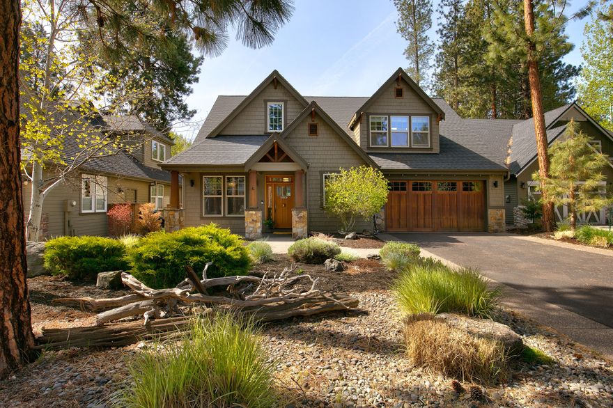 Whychus Creek frontage in Sisters, Oregon! Enjoy stunning views of the creek from your great room, primary suite, outdoor patio and hot tub. This quality 2,821 SqFt craftsman home on a .25 acre lot offers a vaulted great room with propane fireplace, wood stove, and dining area. The gourmet kitchen features concrete countertops, a breakfast bar, butler's pantry, propane 6-burner range, double convection oven, built-in microwave, and warming drawer. The main-level primary suite includes a cozy propane fireplace, walk-in closet, and spa-like bath with a soaking tub, double vanity, and tiled shower. French doors open to a main-level office or fourth bedroom. A spacious laundry/mud room connects to the double-car garage. Upstairs you'll find two large bedrooms, a full bath, and media room. Enjoy outdoor living with creek and trail access, all just a .5 mile from downtown Sisters!