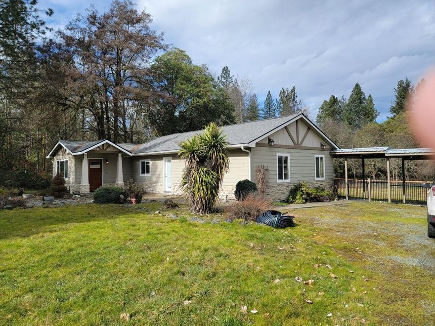 Awesome 4.26 Level acreage located just past the Grants Pass Golf Club.... recently updated home originally built in 1947. Features granite counters, stainless steel appliances, nice kitchen pantry, living room with Large Den that could be a nice formal dining and/or den, nicely updated bathrooms, vinyl windows, LVP flooring & tile for easy cleaning throughout the home.  Property is situated back off road with nice, gated entrance and level property is fenced and cross fenced. There's a nice 3 car garage with large overhead doors, insulated with sink & dog or animal wash located in garage/shop.  Property has lots of room for animals, boat, toys or RV. Located in District 7-schools. Not many like this on the market.  All info deemed reliable but not guaranteed, all buyers to do their own due diligence when purchasing this property.