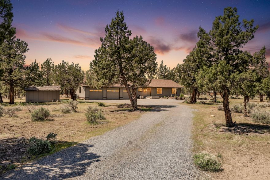 Nestled on 2.74 serene acres with mountain views in Boones Borough, this completely updated one story, 3 bed, 2 bath home offers modern comfort and style in a peaceful setting. A spacious three car garage with new glass and a shed offers storage and room for all of your toys and room to build a shop or ADU! The property features a host of brand new upgrades, including all new siding, new windows, pavers, flooring, light fixtures, ceiling fans, and a cozy gas fireplace that adds warmth and charm to the living space. The spacious kitchen boasts Corian countertops and is equipped with all new Stainless Steel appliances. Underfoot, you'll find new underfloor insulation to enhance energy efficiency year-round. Step outside to enjoy maintained and fire prevention landscaping with a drip irrigation system and sprinklers in both the front and back yards. The less-than-10 year old roof provides peace of mind, while the brand new water heater ensures reliable comfort.