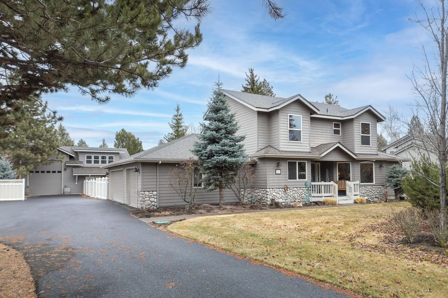 Discover this exceptional home in SE Bend's desirable Orion Estates! Situated on a .5-acre spacious lot, this well-maintained, one-owner home offers 4 bedrooms plus an office, 2.5 baths, and both a living and family room—each with its own cozy gas fireplace and beautiful hardwood floors. Kitchen boasts granite countertops and stainless-steel appliances. Thoughtful upgrades can be found throughout the home and complement the main level primary bedroom with an upgraded en-suite, large closet, and direct access to the hot tub in back. Outside enjoy a large fenced backyard beautifully landscaped along with a big covered deck, perfect for relaxing or entertaining. The long-paved driveway leads to a newer, 30x40 shop with a 14ft RV door in the front and a 8ft garage door out back to an additional storage area. Inside the shop you'll find epoxy floors, 16-foot-high ceilings, and large heating system. A rare find in a prime location! Close to Larkspur Community park, center, and pool!