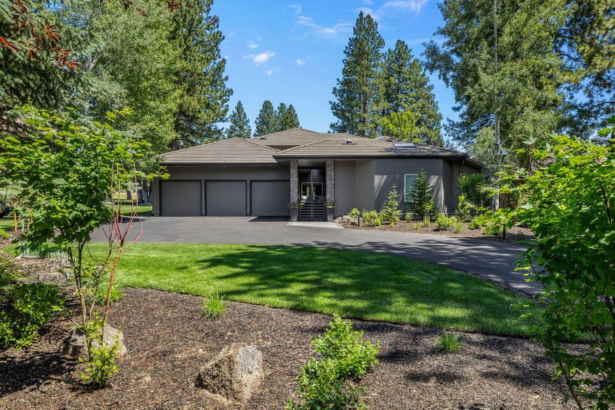 This NW Contemporary home features bright, light filled rooms and expansive main level living with plenty of large spaces inside that flow effortlessly to beautiful new outdoor entertaining spaces. Walls of windows, exposed beams & trusses and stunning views of the 17th fairway, green and lake are featured throughout the home. The private main level primary wing features a fully remodeled bathroom, private patio and  new custom Finnleo dry/steam sauna.  Upstairs offers two additional bedrooms and bathrooms plus a generous family room with built-ins and a second fireplace. The oversized 3 car garage features extensive storage and EV chargers.  As you enter the property, enjoy the newly re-landscaped front yard, new driveway and renovated private courtyard, which is on view from large main level office. Enjoy the quality of this Sun Forest custom home in one of the best locations in Broken Top, w/ convenient access to the club, restaurant, pool, pickleball, park, tennis court & 1st Tee!