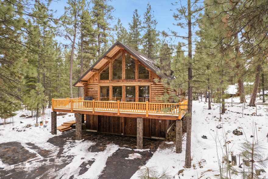 The art of living has been perfected in this superbly executed log cabin. The harmonized style and colors of this home flow beautifully and provide the perfect setting for living and entertaining. Old World craftsmanship provides
vaulted, beamed ceilings, while today's technology shines in the remodeled kitchen/great room, bathrooms and updated systems. Additionally, this .9 acre property includes extensive decks and outdoor space for all activities. Conveniently located on a cul-de-sac close to pools, tennis courts, and all that
the ranch has to offer. Listing agent is related to Seller.