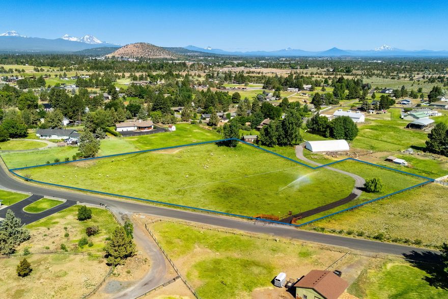**Owner Financing Available** This 3.29-acre homesite offers a rare opportunity to build in a peaceful, pastoral setting just minutes from Bend. With 2.3 acres of senior COID water rights, a gently sloping, well-watered pasture, and mountain views, the land is well-suited for a custom home, hobby farm, or small-scale livestock. The property also offers the potential for an accessory unit, subject to county approval. This is one of two adjacent legal lots of record currently available. Buyers benefit from more favorable pricing when purchasing both parcels—see 61900 Anker Lane for the neighboring property. These pieces of Bend history, offer privacy, usability, and rural charm in a highly desirable Central Oregon location.