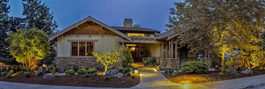 Luxurious light-filled newer Craftsman in historic Ashland neighborhood close to the Plaza, theaters and many Ashland eateries.  The floor plan was designed with exquisite attention to detail; high-quality workmanship and finishes throughout.  During Covid, new Japanese  landscaping and exterior lighting was designed and implemented by Seth Bernard of Solid Ground, and has had several years to mature.  Exterior was painted in 2024.  The main-level primary suite has a 2nd Extraordinaire fireplace and its own private patio which looks onto a water feature, an authentic antique Japanese lantern and gravel pathways.  A 2nd main-level bedroom can function as an office or ???  Open concept living/dining area is open to the gourmet kitchen with access to the view deck.  Below, there is a 2-car finished garage, guest suite, media room, laundry room, wine cellar and multiple storage spaces.