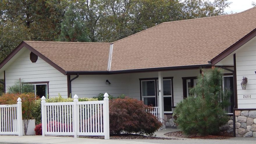 Amazing 4 bedroom, 3 bath, custom built home with an open floor plan. This home is handicapped accessible featuring 2 master suites, gas fireplace, 9Ft ceilings, wired for stereo system throughout, large kitchen with walk-in pantry, breakfast nook with bay window, formal dining room, over sized two car garage with half bath, two water heaters -gas, central heat and air, large covered patio, vinyl fencing, nice landscaping with fruit trees.